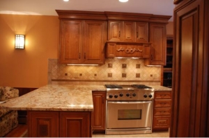 Wall sconce lights add character and ambiance to a traditional kitchen near Detroit, MI.